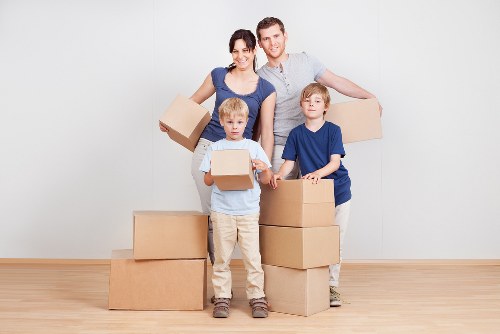 Professional movers loading furniture for removals in Elmersend